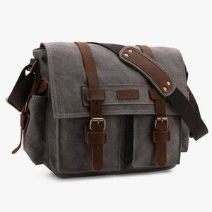 Leather and canvas camera cross body messenger bag.